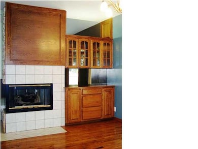 third view of fireplace, and a custom built china 
