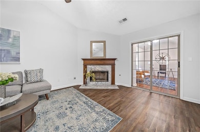 Living room with french doors to sunroom