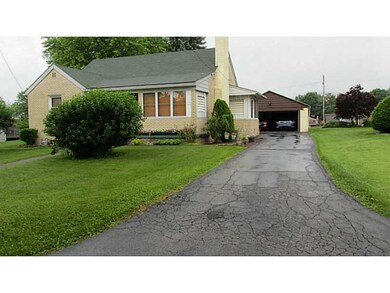 Land. Blacktop driveway to detached garage