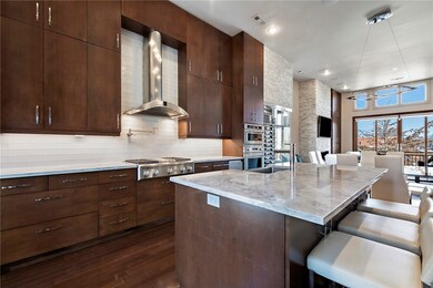 Upscale eat-in kitchen flowing from the main living area.