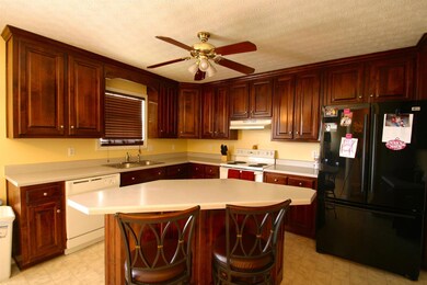 Island Kitchen with Tons of Custom Cabinets
