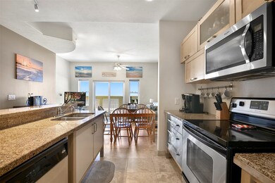 Looking from the kitchen to the dining and living