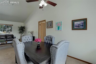 Vaulted ceilings between sitting and dining rooms