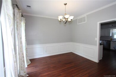 Dining room with traditional wainscoting