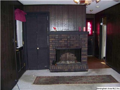 Den with gas fireplace