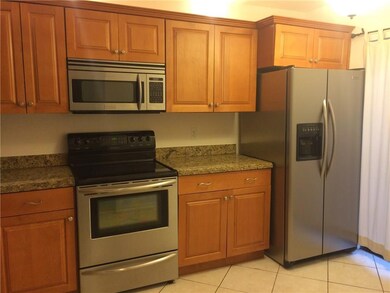 Updated kitchen with granite countertops and stain