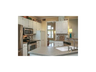 LOVE this tile backsplash and the light and bright