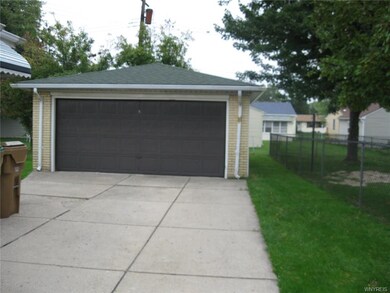 Large 2 car detached garage with concrete drivway