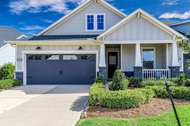 Craftsman style elevation with two car garage, lus