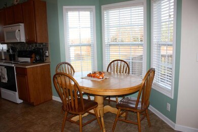 Dining area with bay window.