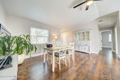 dining room with vaulted ceiling