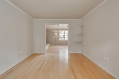 Living room flows nicely into the den with access 