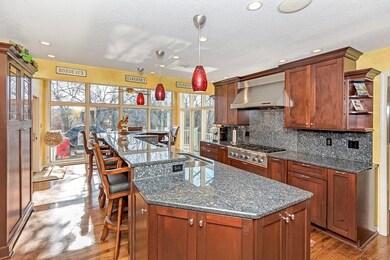 Huge kitchen with Thermador and Sub-Zero appliance