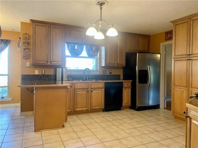 Kitchen w/ granite countertops