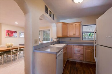 Kitchen features a pass through to dining space