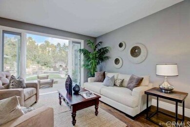 Formal living room overlooks - glass fire-ring .an