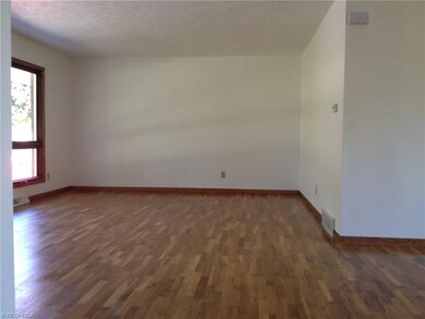 Beautiful hardwood floors in Living Room that exte