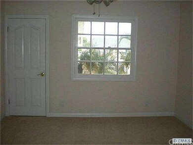 bedroom with garage entry
