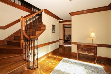 Foyer with a beautiful staircase