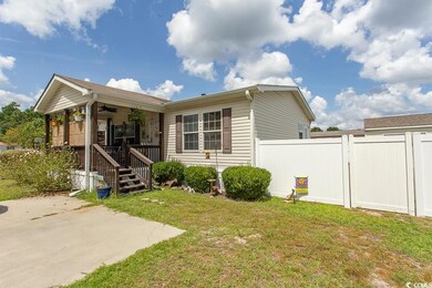 View of front of property with a patio area and a 