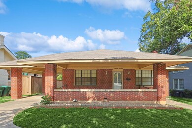 View of front of home featuring a front lawn