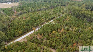 3 acres above road & 8.79 acres below road