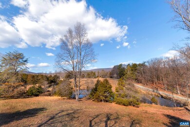 Front winter view with the southwest mountains in the distance.