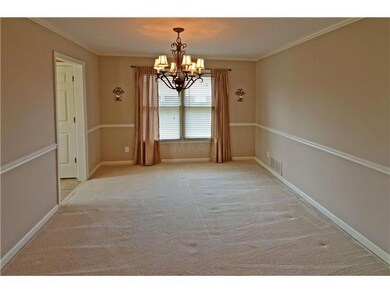 This spacious dining room is just waiting for your