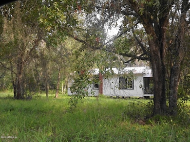 Side View of Home and Land