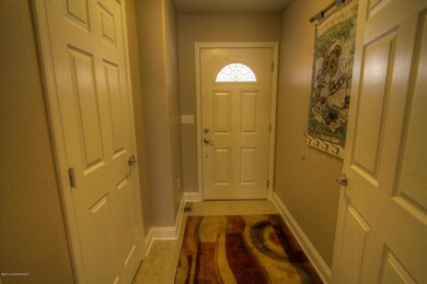 Front entryway with tile flooring