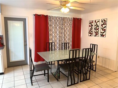 spacious breakfast area door to covered patio . Ti