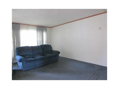 Living Room. Spacious vaulted ceiling in living ro