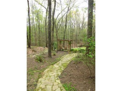 Take the beautiful stoned path from the side of th