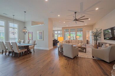 To the left, a formal dining room offers an elegan