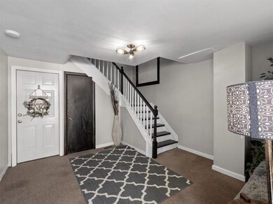 The entry is a shared common space