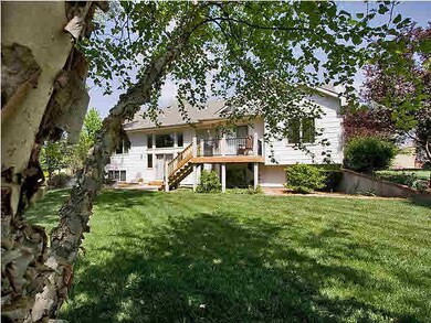 Half Acres +/- with many flowers and trees. Privat