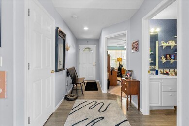 Front entry with beautiful laminate flooring.
