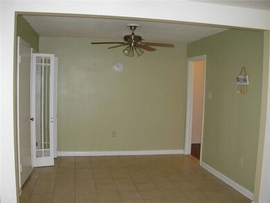 Tile Floors in Breakfast Area with Ceiling Fan and