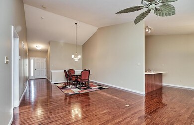 Master Bedroom door on the left, breakfast bar into the Kitchen
