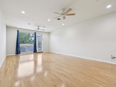 Spare room featuring light wood-style flooring, a