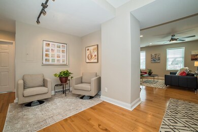 Spacious, open concept living offers high ceilings