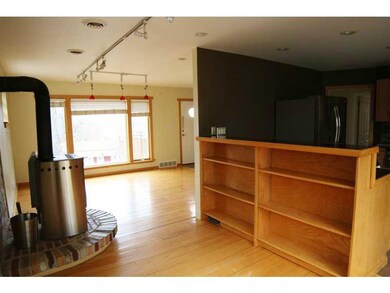 Living Room. Open kitchen to dining room area.