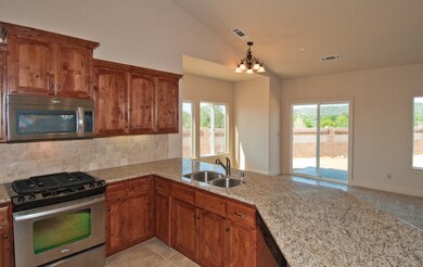 Rich Wood Cabinets, Stainless Appliances