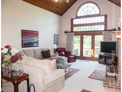 2-story great room with wood cathedral ceilings an