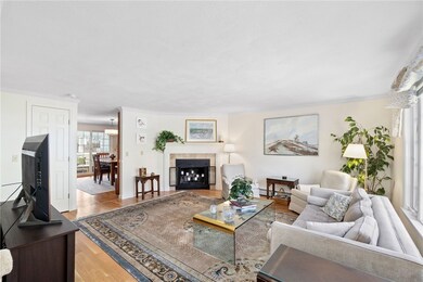 Beautiful hardwood floors and crown molding make t