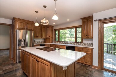 NEW Quartz Counter Tops and Sink, All Kitchen Cabinets Refinished
& New Refrigerator