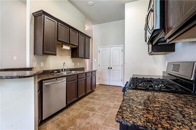 High ceilings throughout! Wrap around bar, stainle