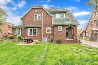 Beautiful, full brick Old Orchard house.