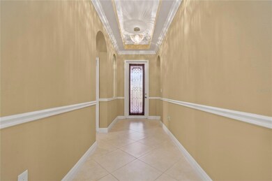 Foyer with extended tray ceiling