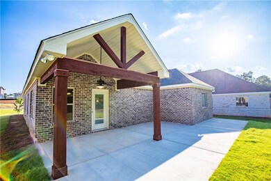 Extended back patio with covered and open areas!